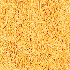 Pattern made from fried potato. Top view, flat design. Fast food.