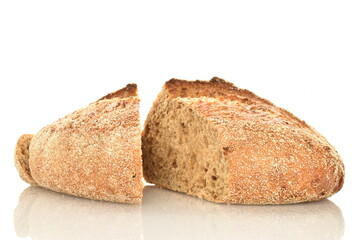 Two halves of a loaf of bread, close-up, isolated on white.