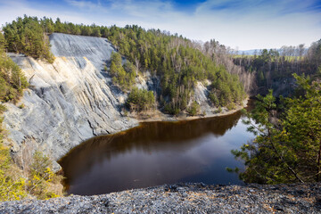 Slate quarry lake with acid water, Hromnice village near Pilsen town, Czech republic
