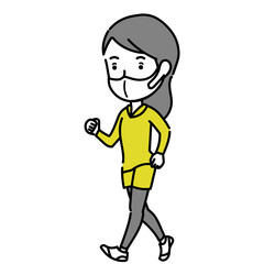 ウォーキングするマスクを着用した若い女性
