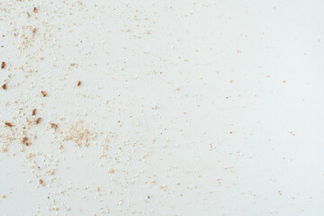 Fototapeta na wymiar Flour texture with seeds. White surface.