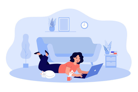 Happy cartoon woman chatting, working, surfing internet at home. Flat vector illustration. Girl doing remote work, lying on floor at cozy living room with laptop and cat. Freelance job concept