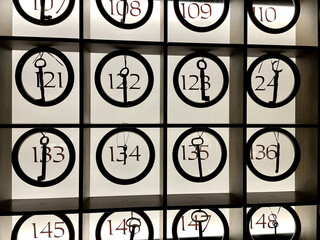 Various vintage keys in a reception of a hotel