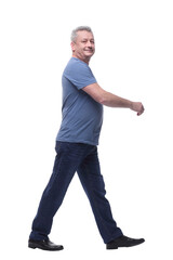 Fototapeta premium Side view full body of a casual man standing