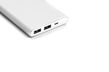 Power bank for charging mobile devices and gadgets on a white background