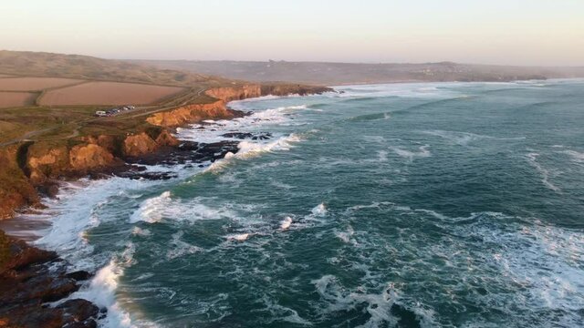 Godrevy to gwithian aerial drone of the sea and coast at sunset 