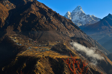The terraced village of Phorste and Ama Dablam (6.812m) from the Everest Base Camp - Gokyo Valley...