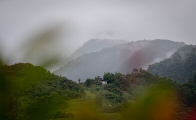 house between mountains