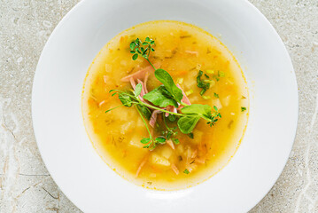 split peas soup on the white plate