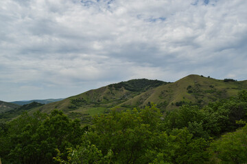 Fototapeta premium View of the hills in spring. Beautiful nature landscape.