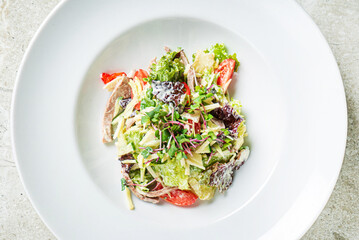 fresh salad with chicken and vegetables