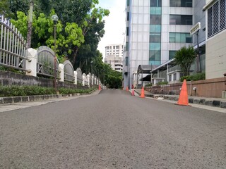 Badan Pendapatan Daerah, Jakarta, Indonesia - December 1, 2020 : Asphalt roads around office areas during the day