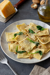Ravioli with ricotta cheese, spinach and nuts. Healthy eating. Vegetarian food. Italian cuisine.