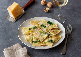 Ravioli with ricotta cheese, spinach and nuts. Healthy eating. Vegetarian food. Italian cuisine.