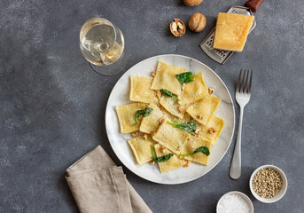 Ravioli with ricotta cheese, spinach and nuts. Healthy eating. Vegetarian food. Italian cuisine.
