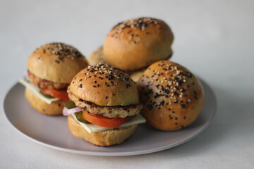 Chicken burger. Prepared by homemade chicken patty, onions, jalapeno and cheese sandwiched inside...