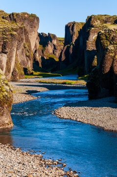 The Majestic Fjaðrárgljúfur Canyon offers dramatic views and a pristine environment of a river that has slowly carved his way in the lavic ground. Southern Iceland