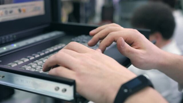 A scientist is working on a computer