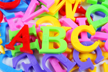 Plastic colorful letters, English letters ABC on the background of letters.