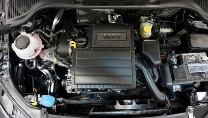 Modern engine. Top view. On the intake manifold there is the MPI lettering. Selected focus.