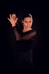 flamenco woman with black dress and clapping