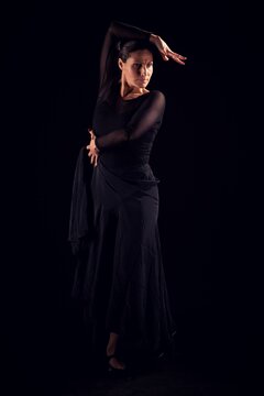 flamenco woman with black dress and arms