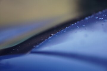 Fototapeta Raindrops On The Blue Car obraz