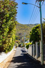 Steep streets for Mountainside  Houses in small coastal town of St James.
