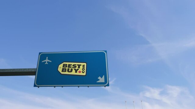 Rome,italy,01-12-2020:airplane passing over best buy retailer store road sign logo,advertising e-commerce billboard online shopping concept