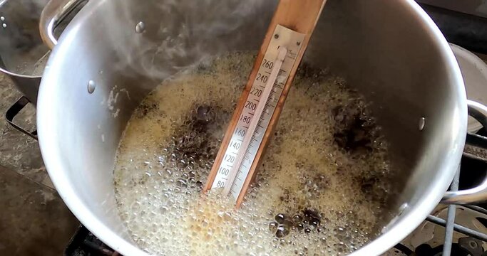 Boiling sap for maple syrup production, maple syrup, Canada