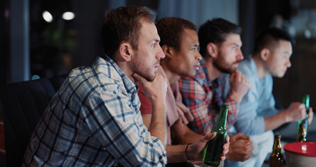 Nightlife. Friendship Concept. Multi-Ethnic Young People Best Friends Meeting and Watching TV Baseball Game Together Cheering and Toasting Beer.