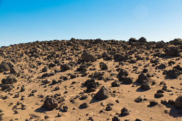 Rocky dry ground on sunny day