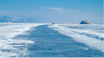 Ice surface of Baikal. Ice road along which in winter you can get by car from the mainland to Olkhon Island on Lake Baikal.