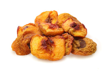Pile of slices dried peaches isolated on white