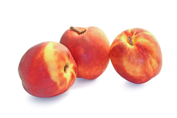 Three tasty nectarines isolated on white