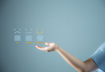 Business people touch virtual screen on happy emoticon icon