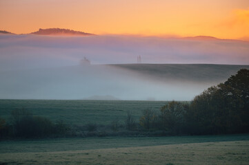 Fairy tale scenery, sunrise foggy autumn morning
