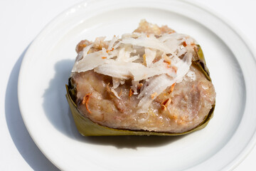 Steamed Banana Cake on white background.