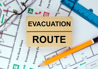 Wooden blocks with text Evacuation Plan Architectural design, sketch, drawing paper, drawings, simple pencil.