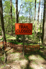 Fototapeta premium Trail Closed Sign in the Middle of the Woods