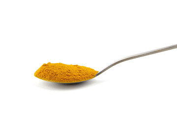 Curcuma powder in spoon isolated on white background. Turmeric spice