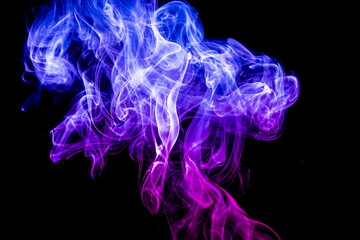 Colored smoke on black background