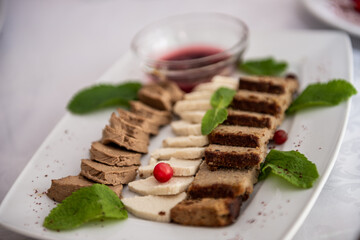 Slicing pates on a white plate