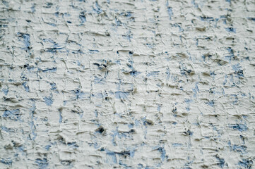 Closeup macro shot of white and blue acrylic textured paint