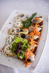 Slicing different types of fish. Cutting red and white fish. Festive table