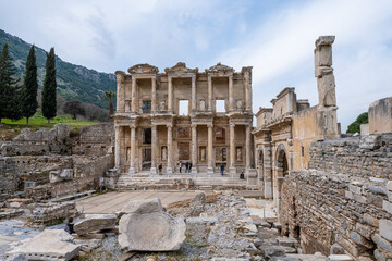 Fototapeta premium wide angle view of famous Celsus Library third largest library in the ancient world in Ephesus ruins, historical ancient Roman archaeological sites in eastern Mediterranean Ionia region, Selcuk, Izmir