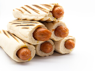 pile of french hot dogs on white background