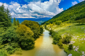 beautiful landscape, mountain river, forest and clouds