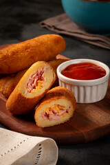 Fried risoles or Risol. Risoles stuffed with cheese and ham.