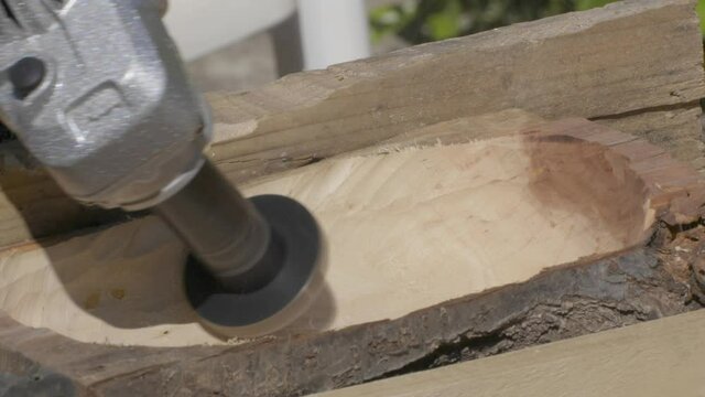 carving olive wood close-up